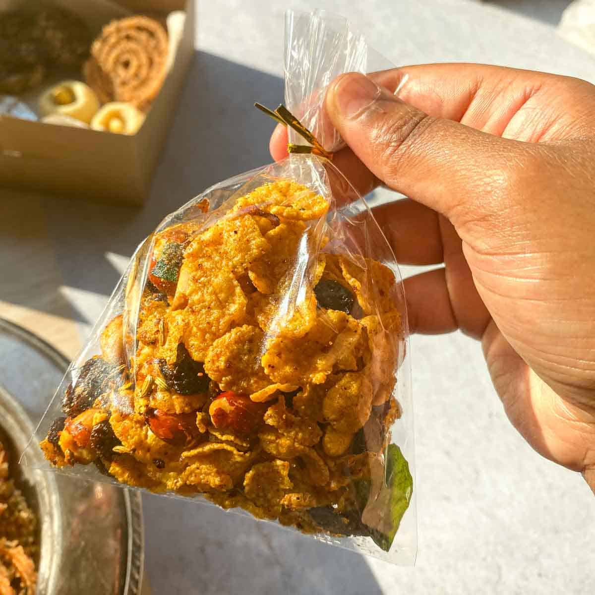 South Indian cornflake mixture in a plastic baggie for diwali boxes