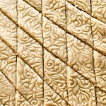 Kaju katlis with etched pattern on it