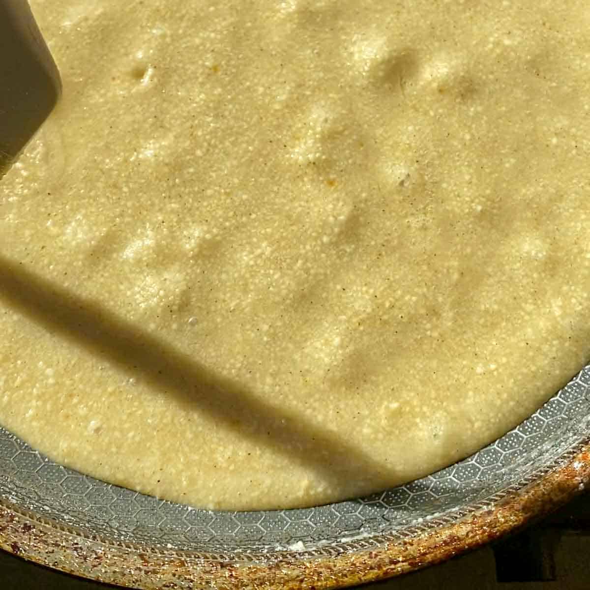 Kaju katli dough when it is undercooked and still runny