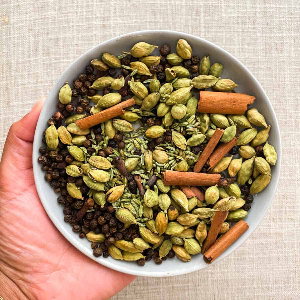 Toasted cardamom, black peppercorn, cinnamon, fennel, and cloves for chai