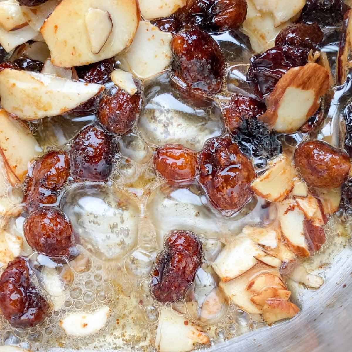 Raisins and nuts roasting in ghee