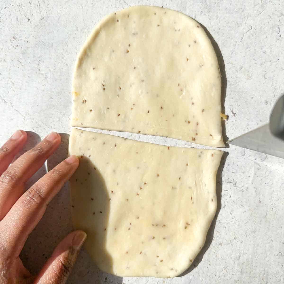 Samosa dough cut in half
