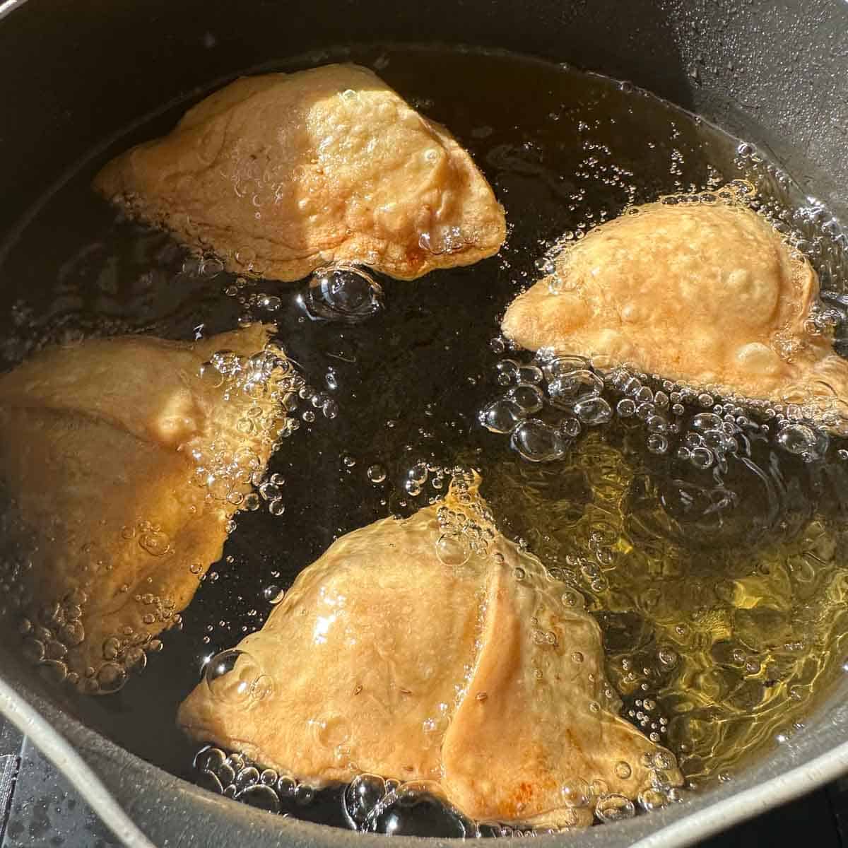 Samosas fried in oil