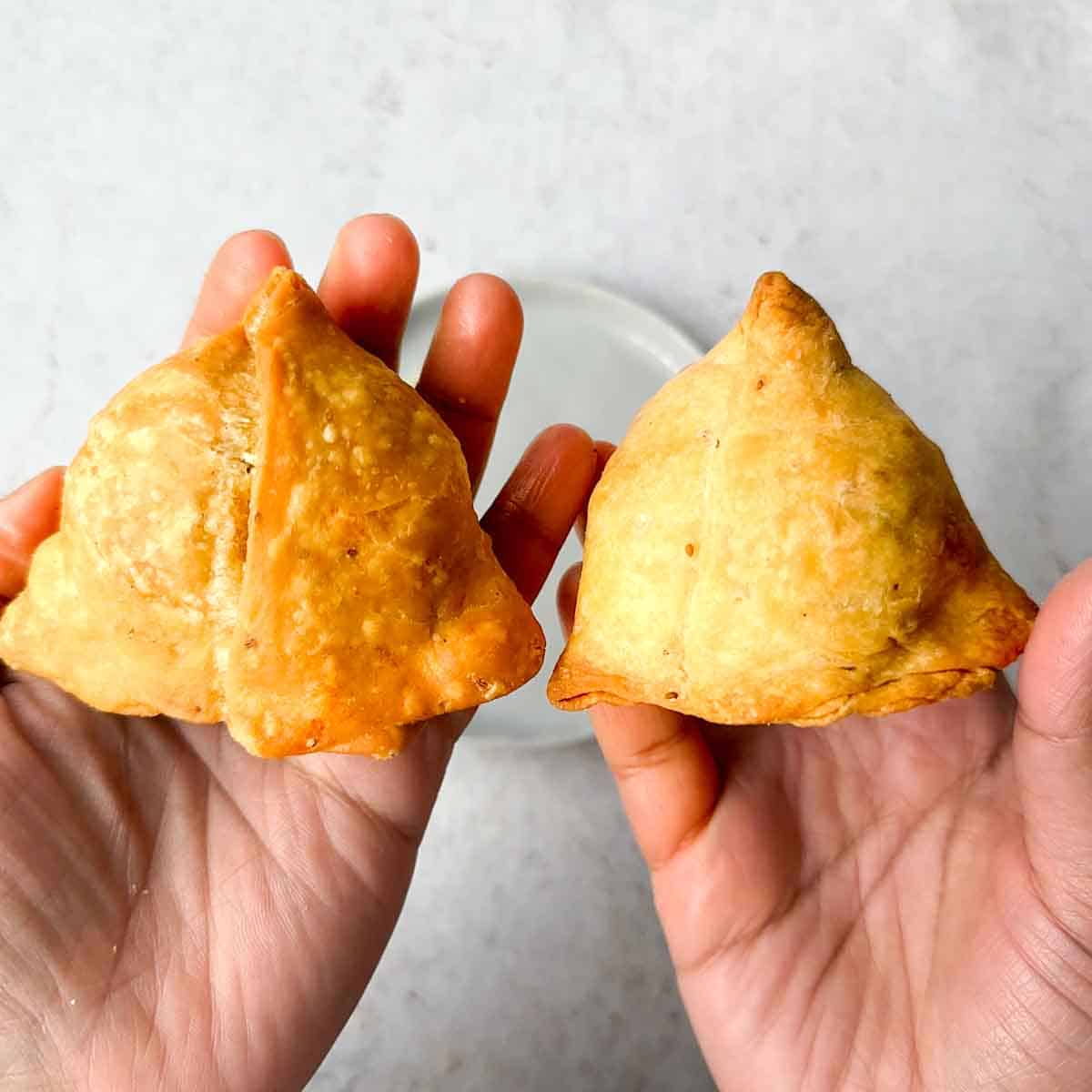 Fried samosa on the left vs. baked samosa on the right