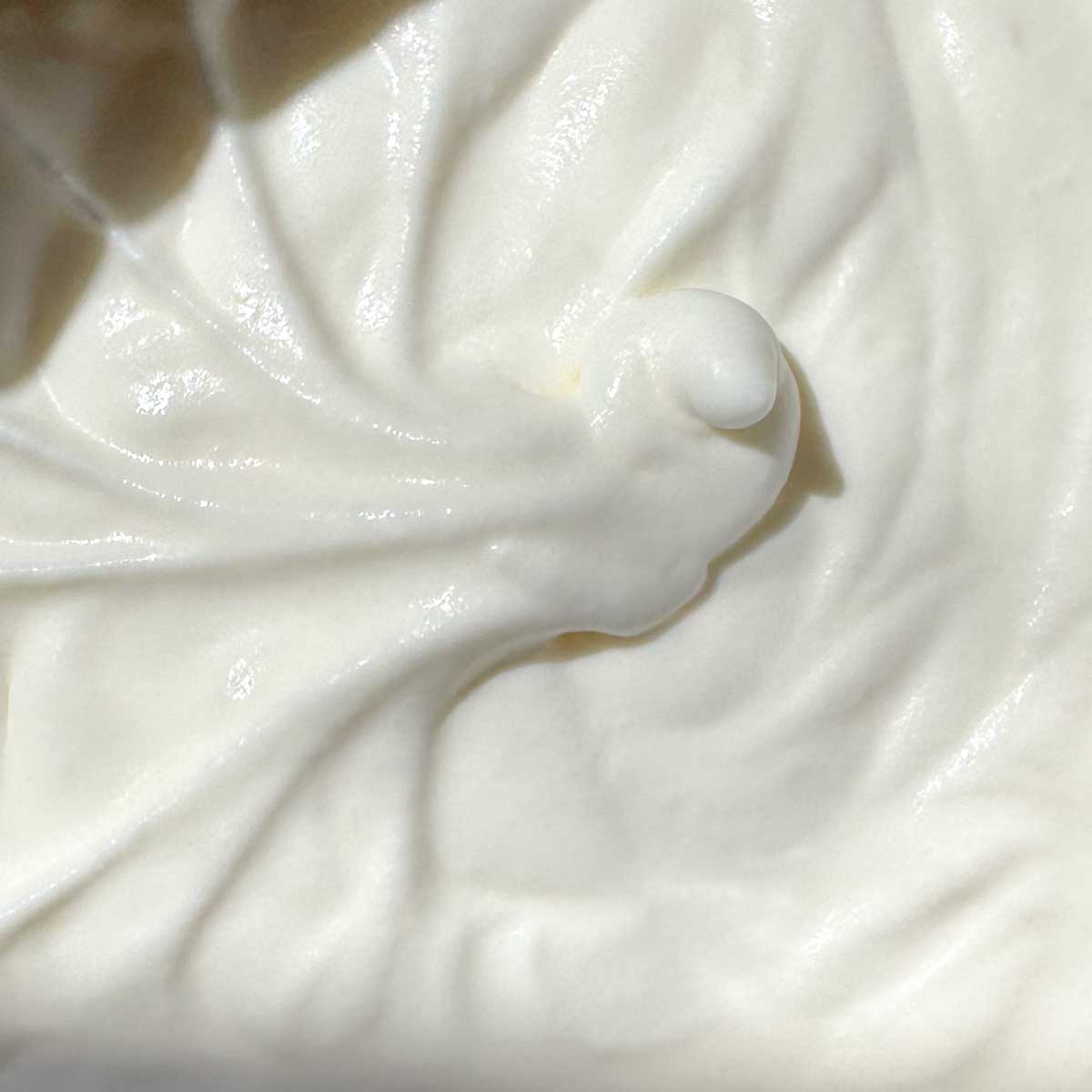 Whipped cream whipped to soft peaks