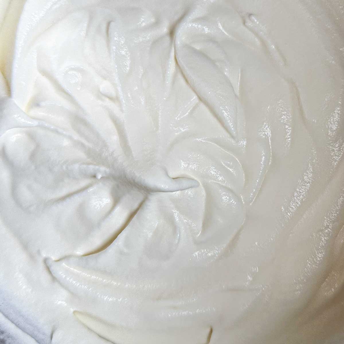 Whipped cream whipped to stiff peaks