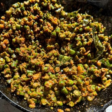 Beans poriyal in a cast iron pan