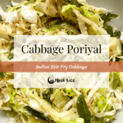 A gray bowl with cabbage poriyal or cabbage stir fry in it.